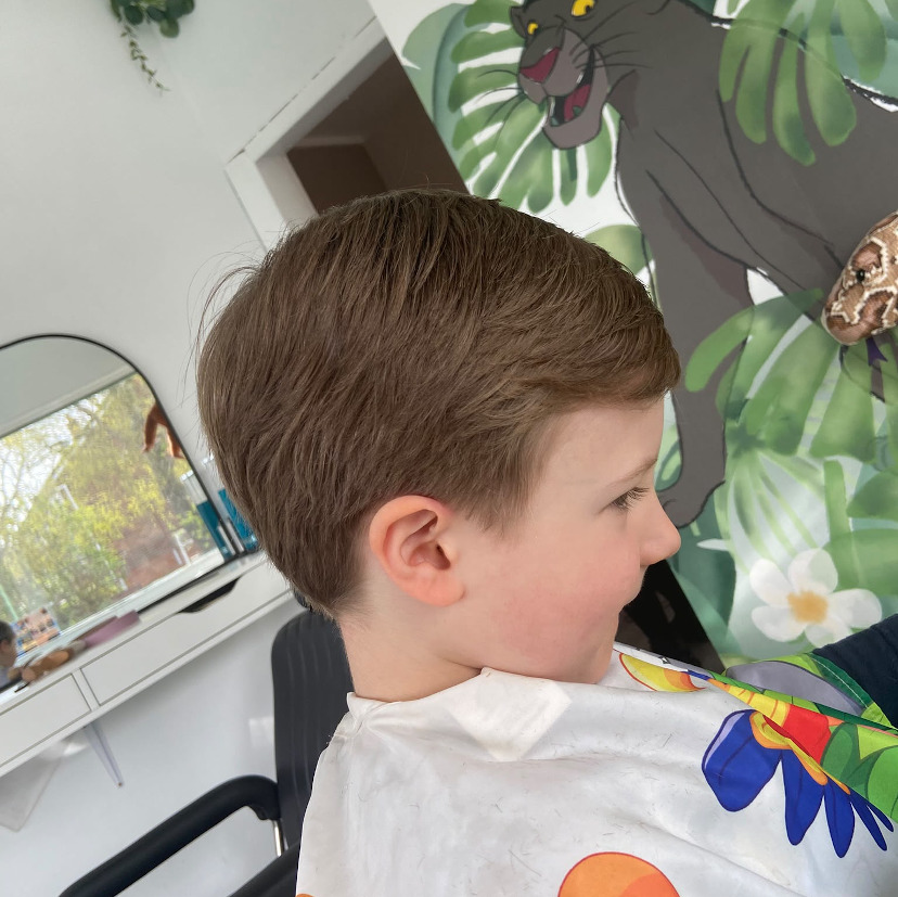 picture of child having hair cut