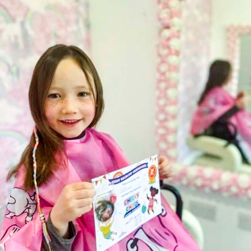 picture of child having hair cut