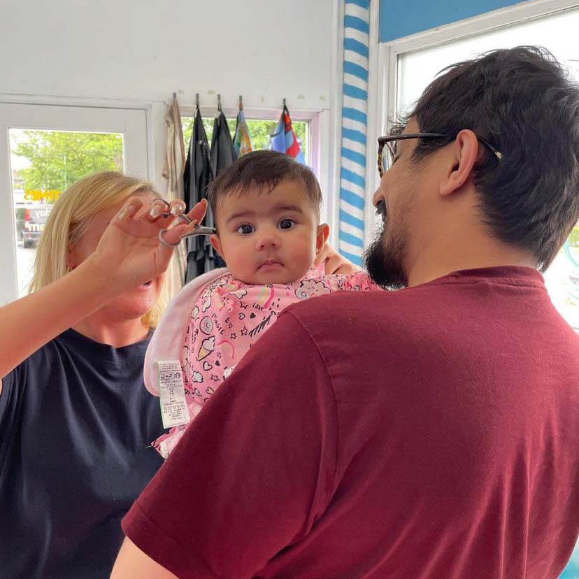 picture of child having hair cut