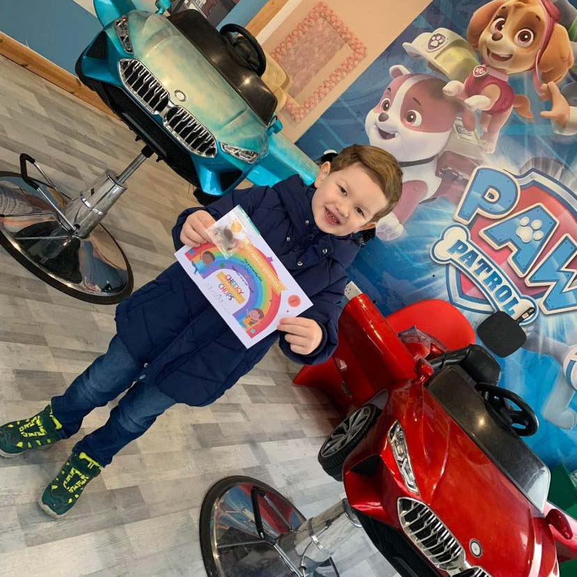 picture of child having hair cut