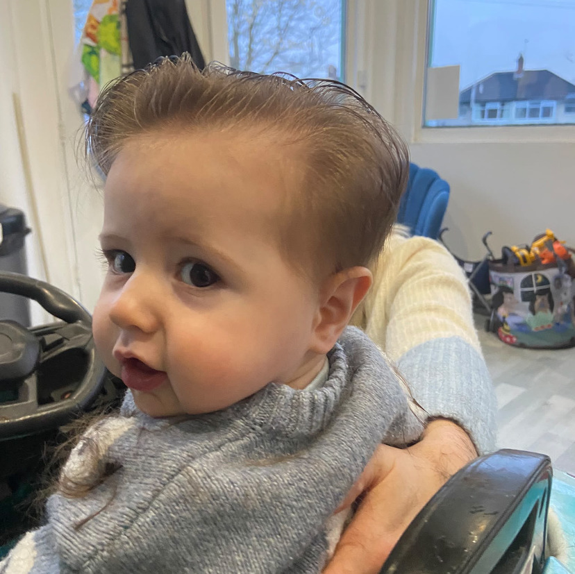 picture of child having hair cut